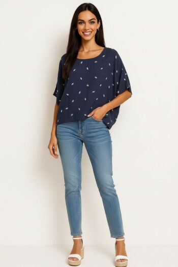 BLUSA BOTONES EN ESPALDA